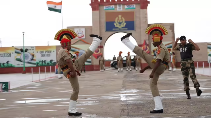 BSF soldiers performing the high-kick drill during the Beating Retreat ceremony at the Attari-Wagah border in Amritsar.