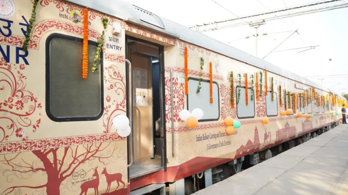 The Bharat Gaurav Deluxe AC Tourist Train parked at an Indian railway station prior to departure.
