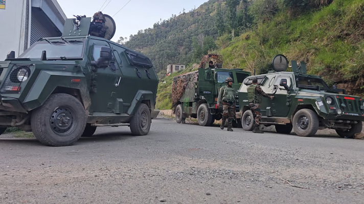 Indian security forces establishing a cordon in the forest areas of Rajouri during anti-terror operation.