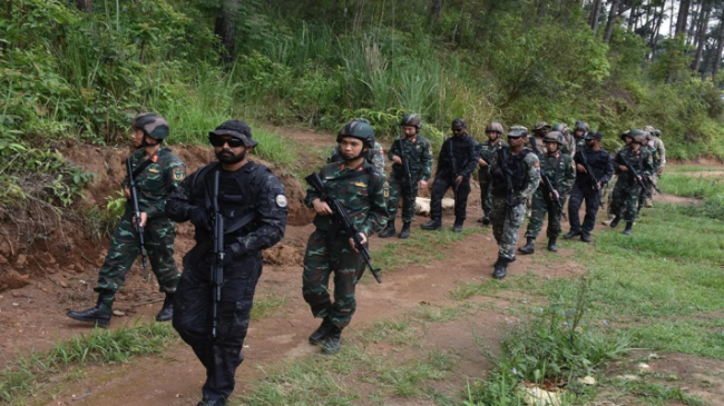 Soldiers from friendly foreign nations conducting mixed-team tactical jungle drills during the Pragati 2026 multinational military exercise at Umroi, Meghalaya.
