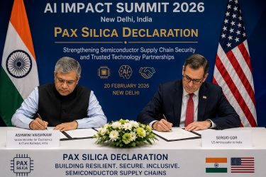 Union Minister Ashwini Vaishnaw and US Ambassador Sergio Gor signing the historic Pax Silica Declaration at the AI Impact Summit 2026 in New Delhi, cementing India semiconductor supply chain security.