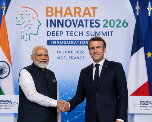 Prime Minister Narendra Modi and French President Emmanuel Macron shaking hands at the Bharat Innovates 2026 deep tech summit inauguration in Nice, France.