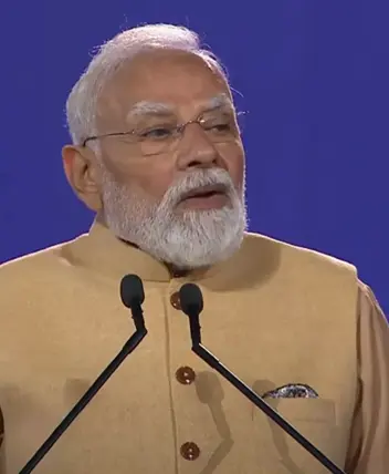 Prime Minister Narendra Modi speaking in Melbourne with futuristic 6G telecom towers, AI-powered digital networks, semiconductor chips and a smart city skyline representing India's 6G Vision and the future of telecommunications.