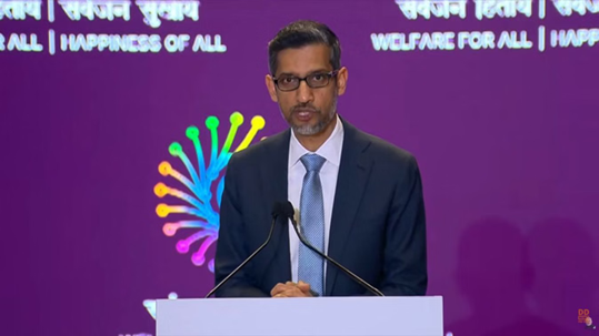 सुंदर पिचाई AI-India Impact Summit में भाषण देते हुए